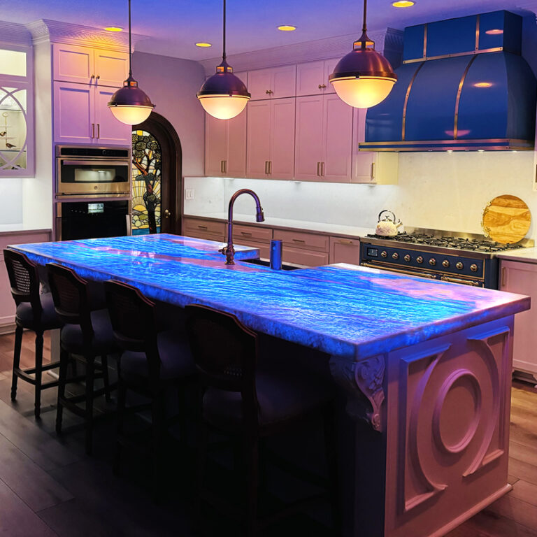 Backlit quartzite island kitchen in Miami Beach