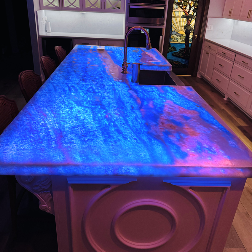 Backlit quartzite island kitchen in Miami Beach