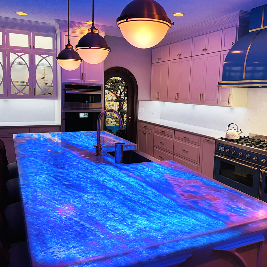 Backlit quartzite island kitchen in Miami Beach